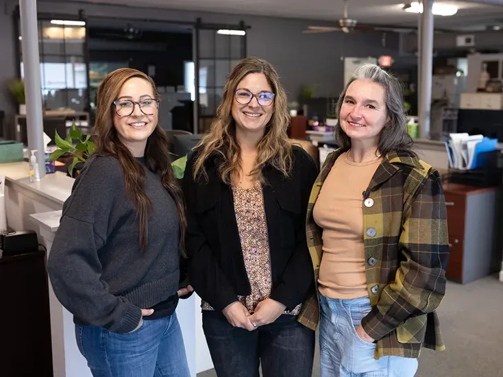 Three Tidwell team members in the Atascadero office